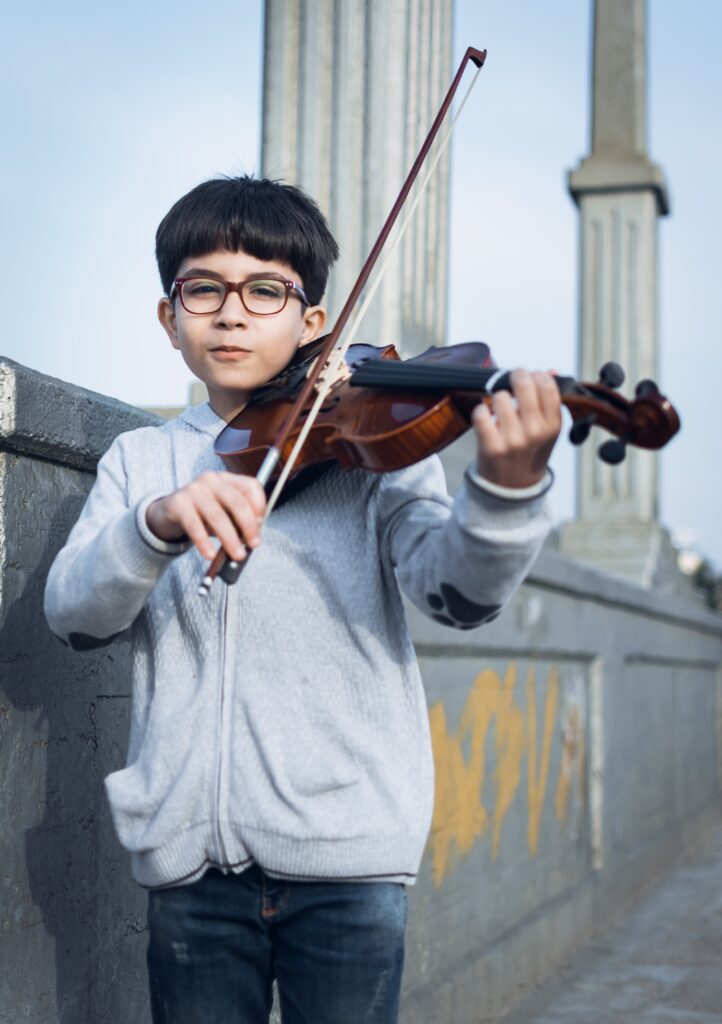 Boy Playing The Violin 722x1024 