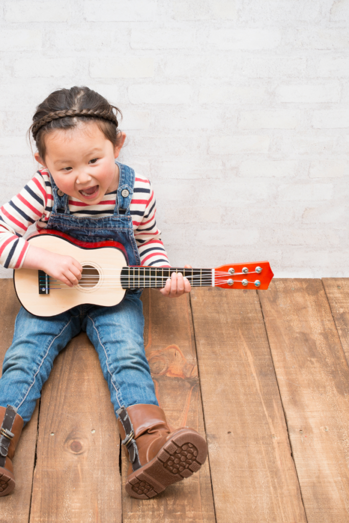 kid playing ukulele | Ukulele Lessons for Kids | Sacramento Ukulele Teacher