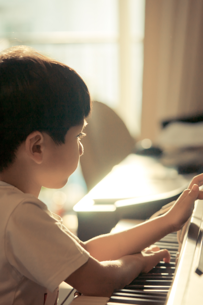 kid taking online piano classes | Online Music Lessons | Online Piano Teacher